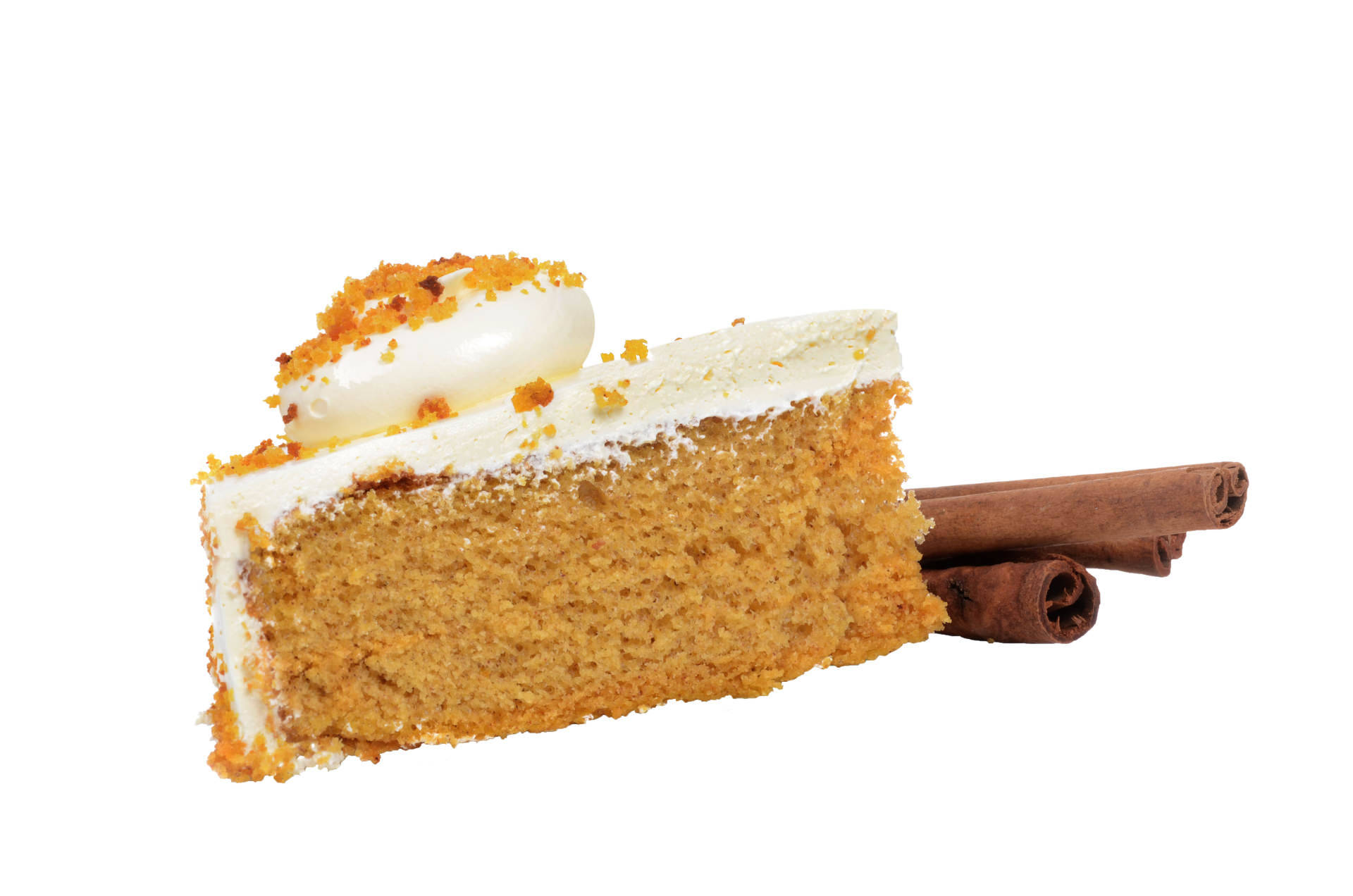 Frosted spice cake with cinnamon sticks